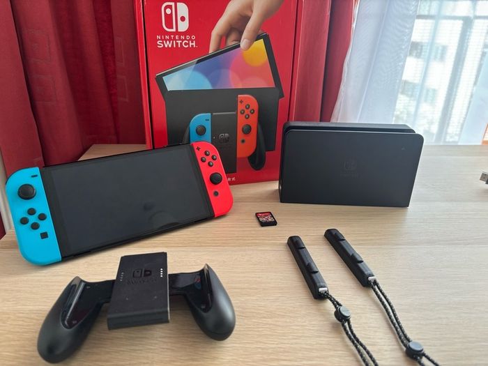 Nintendo Switch OLED (Neon Blue/Red) + Mario Kart 8 Deluxe + Super Mario Bros. W