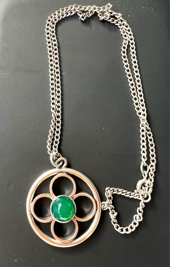 Sterling silver necklace with four -leaf floral pendant