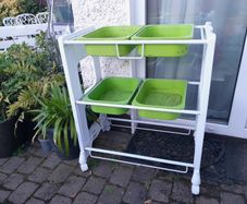 Storage unit on castors and 4 Ikea trofast boxes