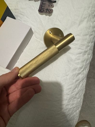 New knurled brass door handle