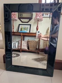 Mirror with black glass frame