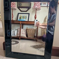 Mirror with black glass frame