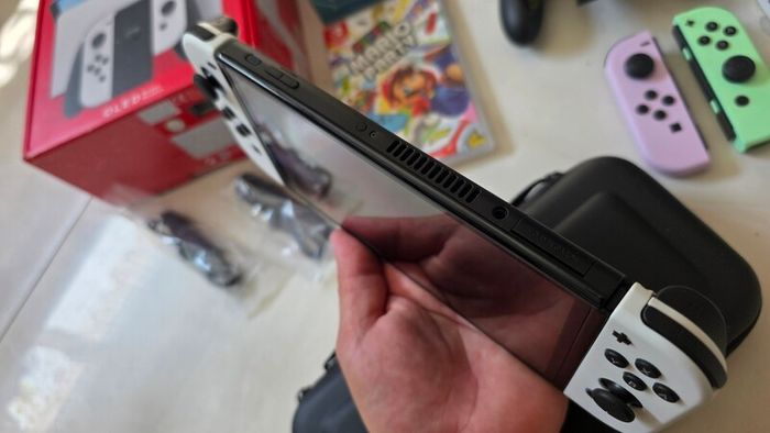 Nintendo Switch Oled + extras