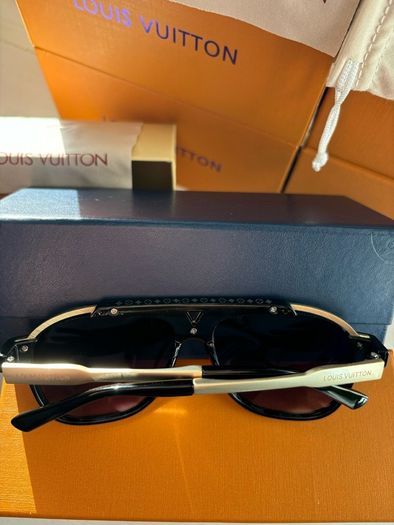 Lv glasses/shades purple tint