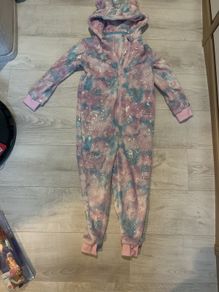 Unicorn onesie age 8-9