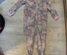 Unicorn onesie age 8-9