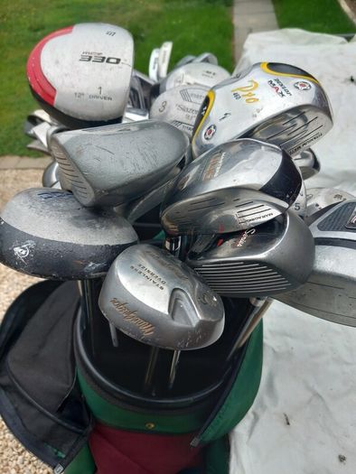 A selection of golf clubs and bags. NOT SELLING SEPARATE