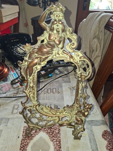 Beautiful Pair of Antique Art Nouveau Beatrice. Bronzed Photo Frames Cherub. a stunning lady lies on the top of the frame with beautiful scrollwork descending down the frame to a winged Cupid or Angel
