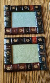 Vintage pair of leather book style photo frames
