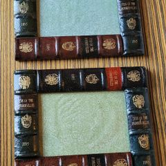 Vintage pair of leather book style photo frames