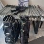 A selection of golf clubs and bags. Image 9