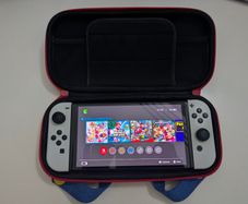 Nintendo Switch OLED (In the box) + Case + Super Mario Odyssey + Bomberman
