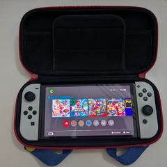 Nintendo Switch OLED (In the box) + Case + Super Mario Odyssey + Bomberman