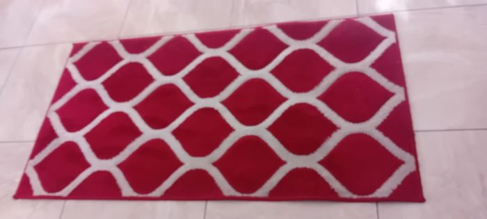 red and cream rug