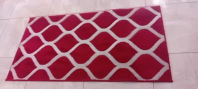 red and cream rug
