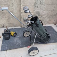 Cheap set of golf clubs and trolley
