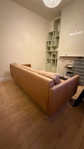 Three seater contemporary tan leather sofa