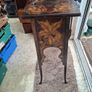 Antique Art Nouveau Table features intricate Pyrogravure Poker Work design around 1900 and arched supports Image 5