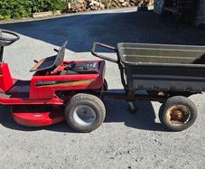 Ride on mower and trailer
