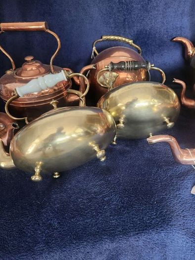 Vintage brass and cpper kettles. polished and beautiful.