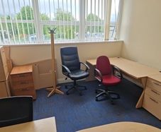 Office furniture for sale. Two desks with drawer pedestals and three chairs.