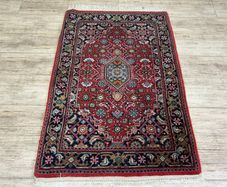 Original Persian hand knotted rug with  label