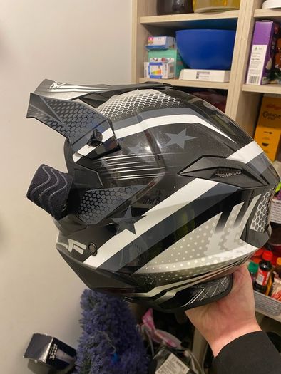 motocross helmet , gloves , goggles