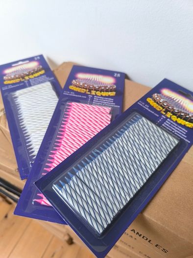 Birthday candles in sets of 25. 1900 packs resale opportunity.