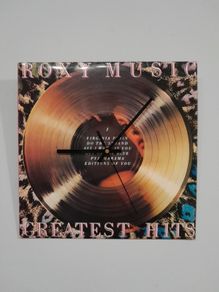 ROXY MUSIC ALBUM COVER CLOCK. 1977 Made In Ireland 12" Vinyl Record Album Sleeve. New Sweeping hand Quartz Clock Mechanism.