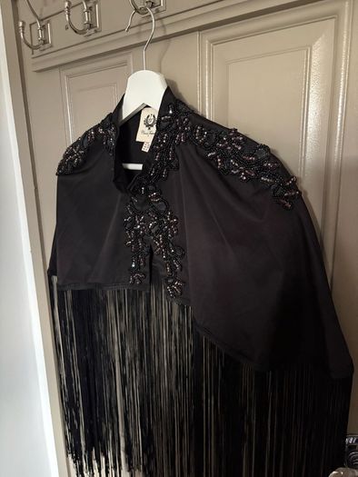 Heavily embellished limited edition exaggerated fringe cape cult piece