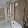 Crosswater optix 10 1400x800 brushed brass slider with side panel Image 2