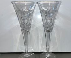 Two Waterford Crystal Peace Champagne Flutes