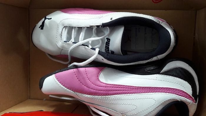 New pink white and navy junior puma trainers