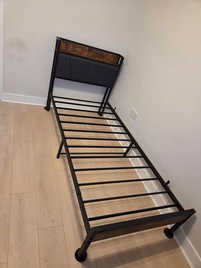 Single bed with mattress and topper