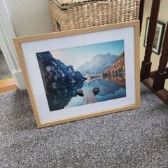 Framed lake mountain landscape scene