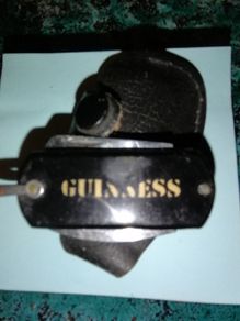 Guinness fob with pen knife