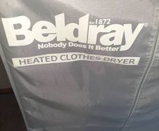 Heated clothes dryer