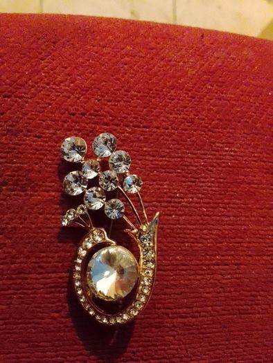Gold plated brooches