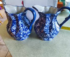Set of 2 Victoria Ware Ironstone Pitcher, Calico Blue & White Floral flower transfer ware. each 80.00 Euro each or the set of 2 for  150.00 euro Made in England, typically dating from the mid-20th century. in very good condition .