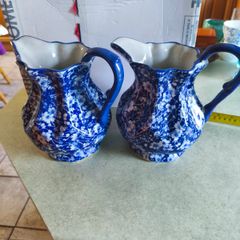 Set of 2 Victoria Ware Ironstone Pitcher, Calico Blue & White Floral flower transfer ware. each 80.00 Euro each or the set of 2 for  150.00 euro Made in England, typically dating from the mid-20th century. in very good condition .