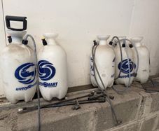 5 old pump bottles and parts