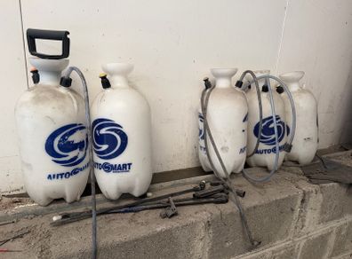 5 old pump bottles and parts