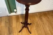 Solid maghoney plant stand. 34in high x 13in diameter