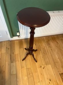 Solid maghoney plant stand. 34in high x 13in diameter