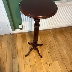 Solid maghoney plant stand. 34in high x 13in diameter