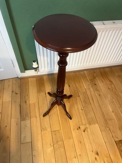 Solid maghoney plant stand. 34in high x 13in diameter