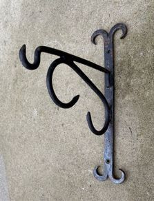 Antique forged and welded iron sign hangers