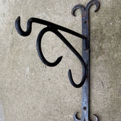 Antique forged and welded iron sign hangers