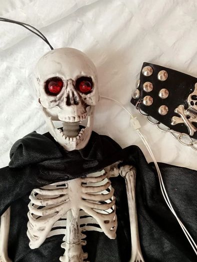 Spooky Hanging Halloween Skeleton Decoration with Light-Up Eyes