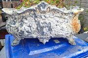Very Large Heavy Antique French Cast Iron Outdoor Planter, featuring ornate Rococo or Louis XV style decorations, organic scrolls, and swags Luxury Flower Holder of its time